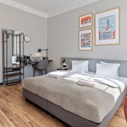 Pokoje & Apartamenty