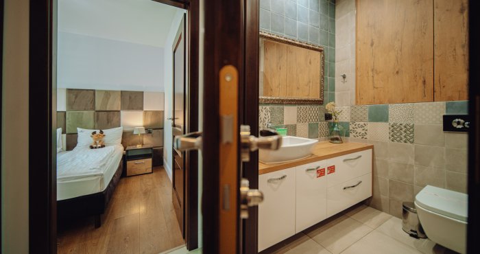 Grand Plus Apartament z 2 sypialniami oraz balkonem