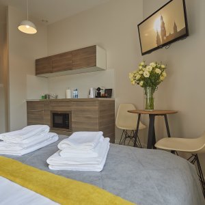 Komfortowy apartament idealny na city break w Krakowie, łączący wygodę i świetną lokalizację.