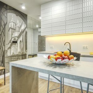 Nowoczesny apartament z oryginalną tapetą, która przyciąga uwagę i nadaje wyjątkowego charakteru wnętrzu