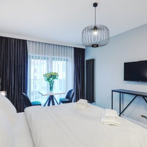 Nowoczesny apartament w sercu Krakowa z telewizorem, idealny na wynajem
