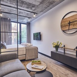 Room with a comfortable bed, perfect for a long rest in Krakow