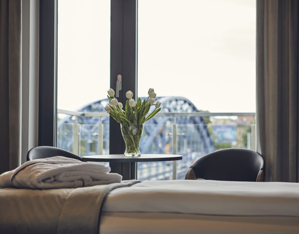 City skyline visible from a large room window