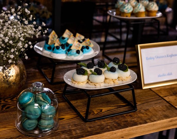 Blue mini desserts on a sweet table during a baby shower at Art&Craft Atelier