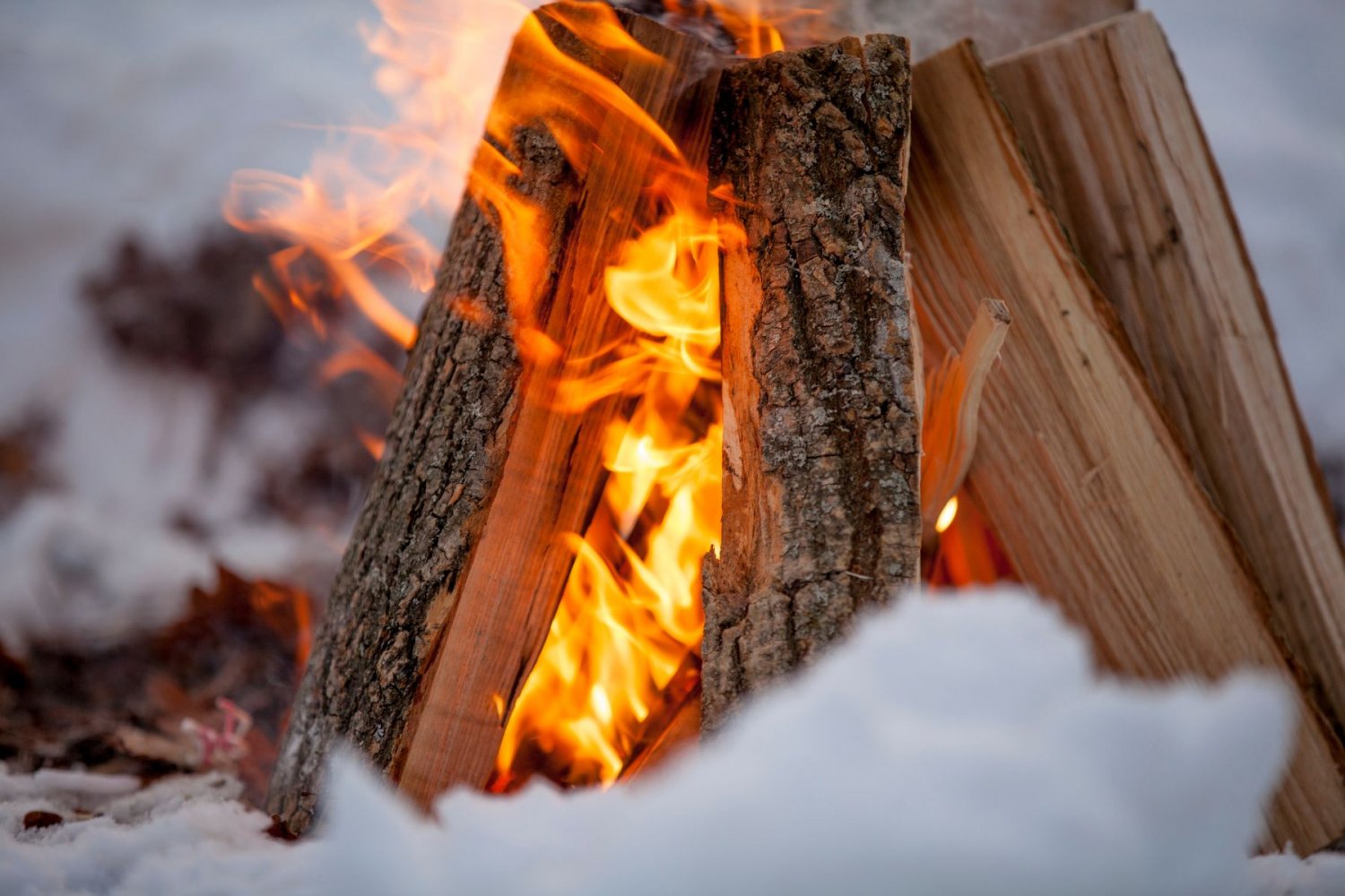 Winter feasts by the campfire with sausage roasting