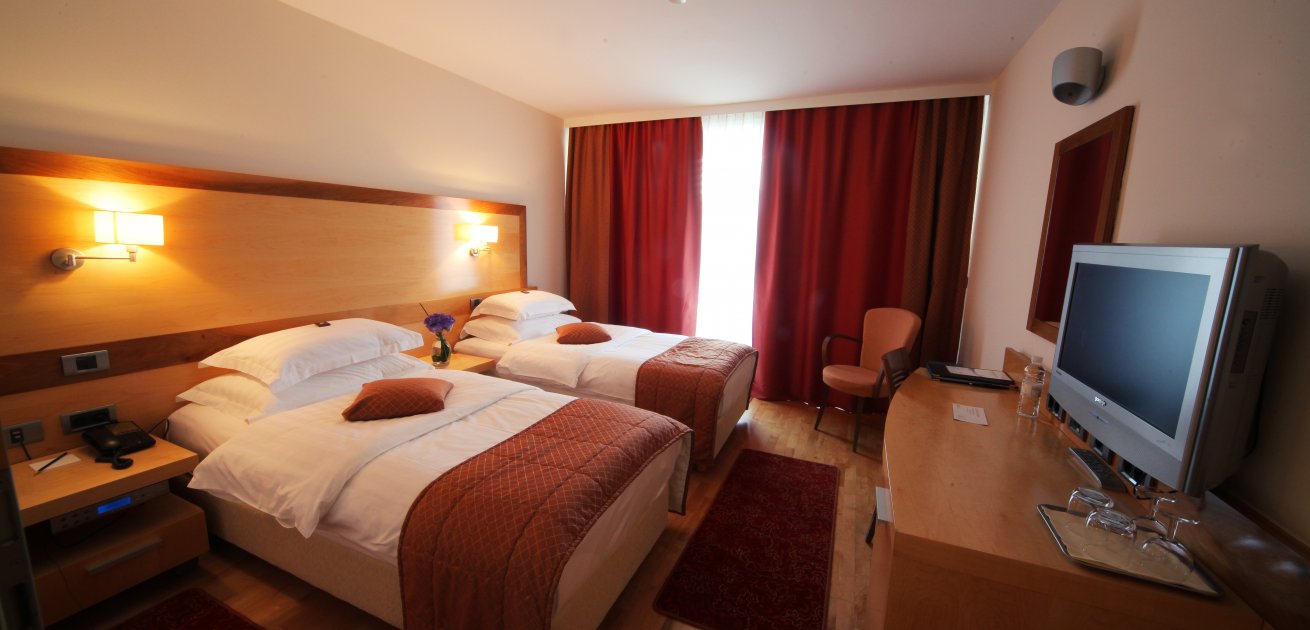 Soba z enojnima posteljama